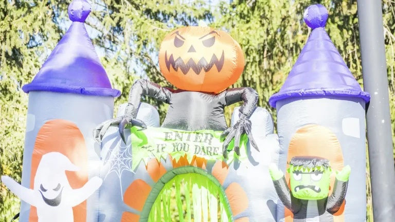 Inflatable Halloween castle yard decoration with a pumpkin, ghost and monster