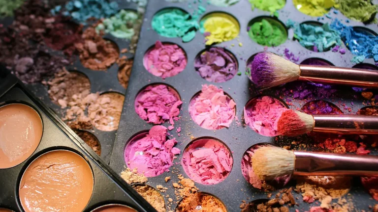 Colorful makeup palette with brushes
